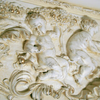 Painting of stucco molding.Angels