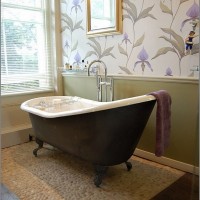 beautiful-feminine-bathroom-with-vintage-bathtub-and-elegan-wallpaper-with-flower-bud-and-leaf-motif